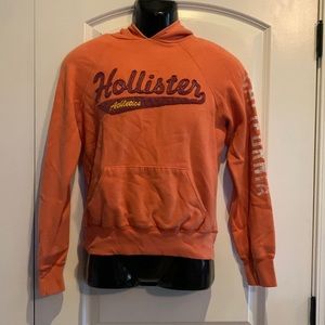 Hollister orange hoodie with sleeve accent